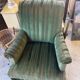Set of two green velvet toad armchairs with fringe