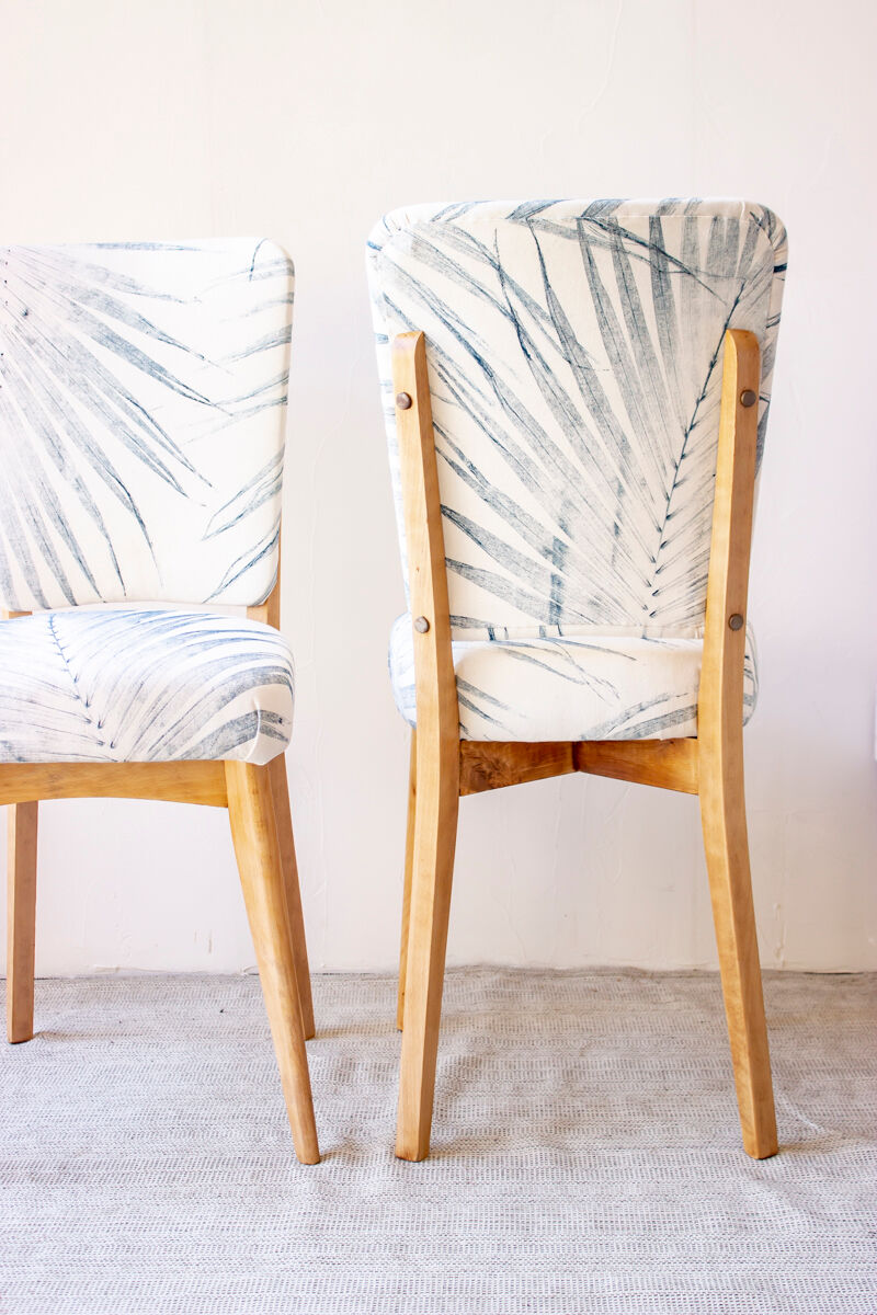 Pair of vintage chairs reupholstered with palm pattern fabric