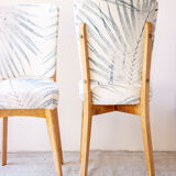Pair of vintage chairs reupholstered with palm pattern fabric