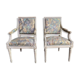 Pair of Louis XVI style convertible armchairs