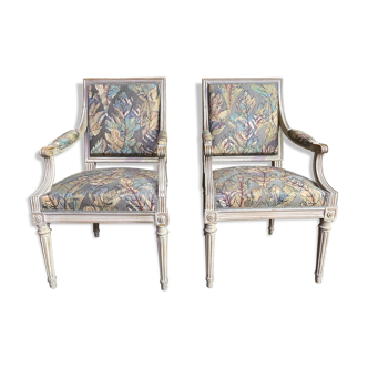 Pair of Louis XVI style convertible armchairs