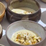 A small stoneware bowl, brown exterior, speckled grey interior D15