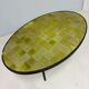 Oval coffee table in glazed ceramic and black metal, DLG by Mado Jolain.