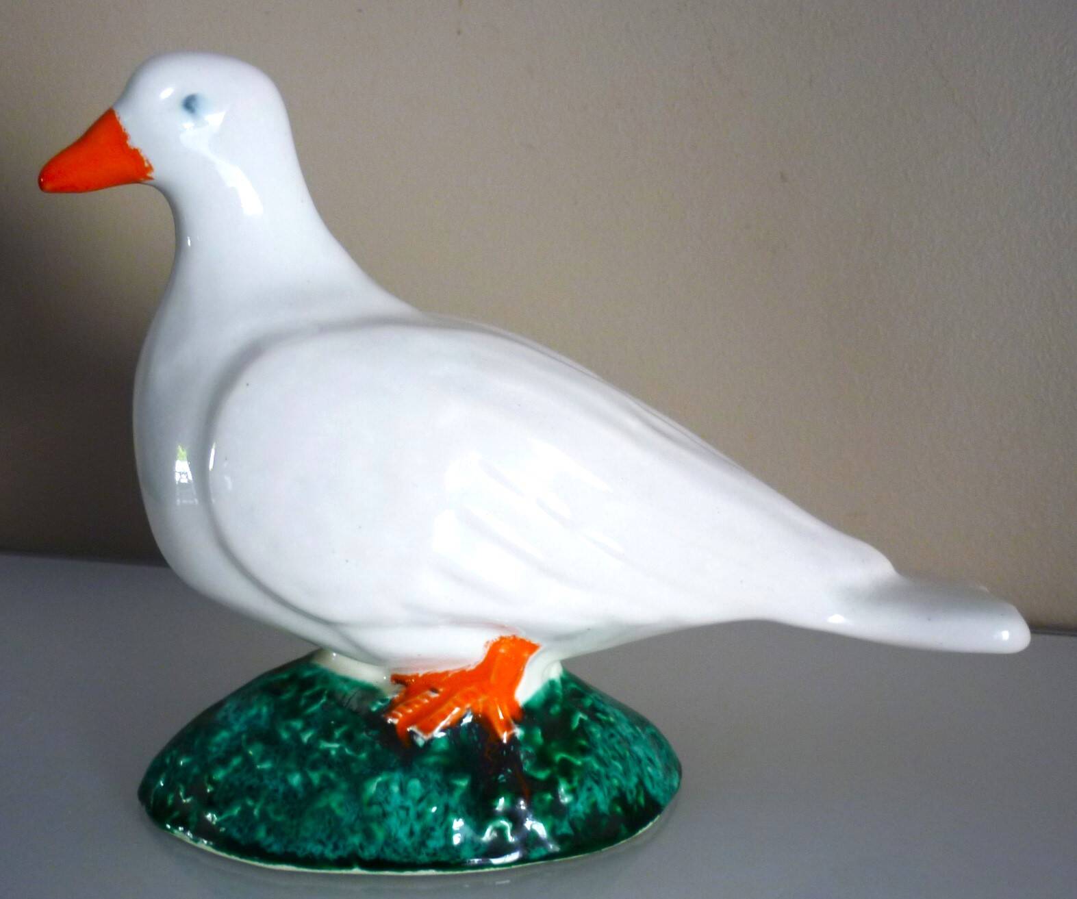 Glazed ceramic bird, signed Vallauris with bright colors