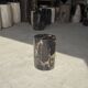 Small side table in black petrified wood with stripes and beige bottom H28.