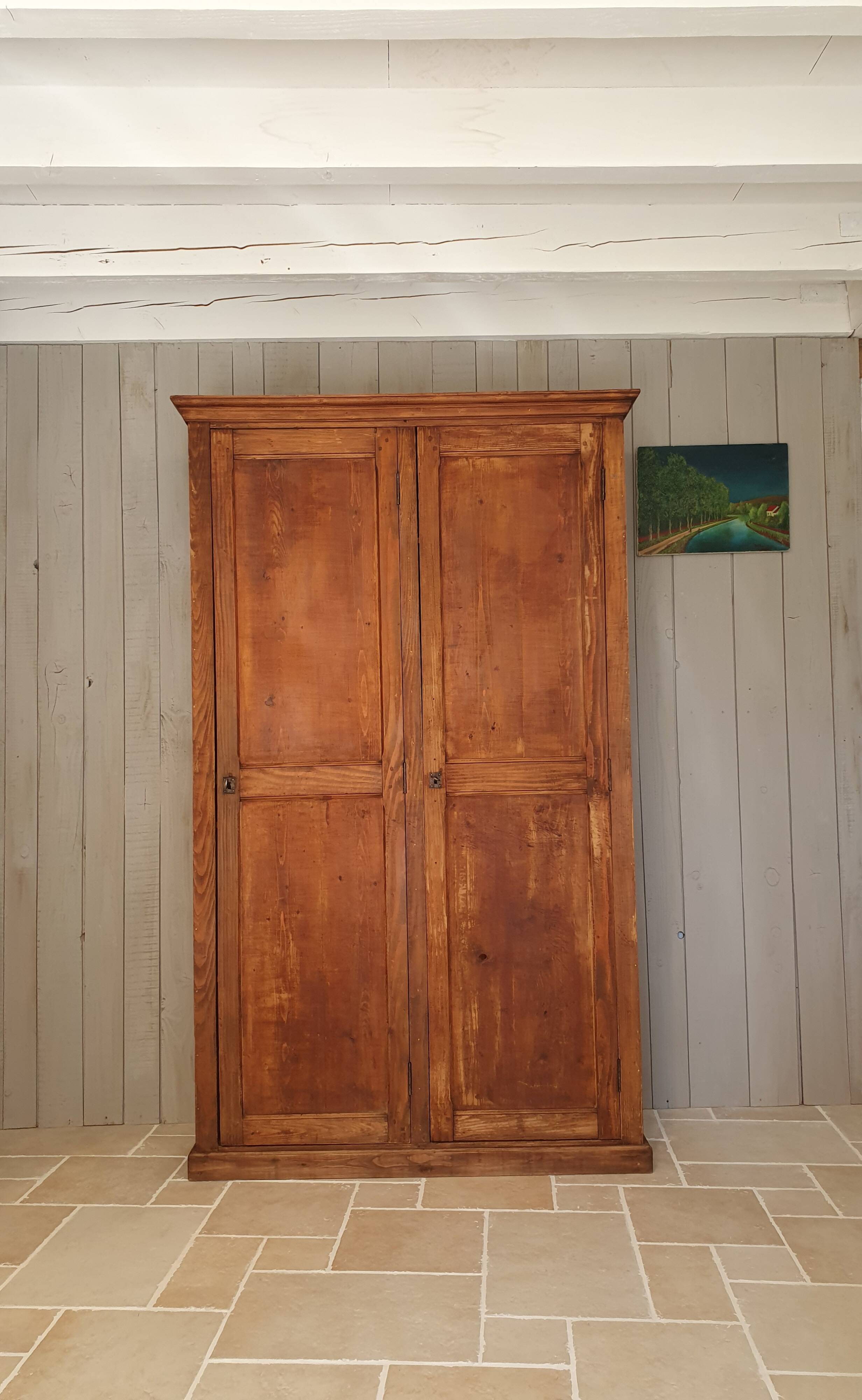 Parisian wardrobe in raw wood
