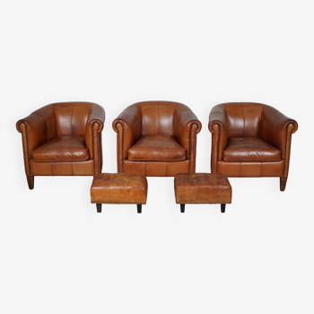 Fauteuils club vintage en cuir cognac, pays-bas, ensemble de trois avec deux repose-pieds