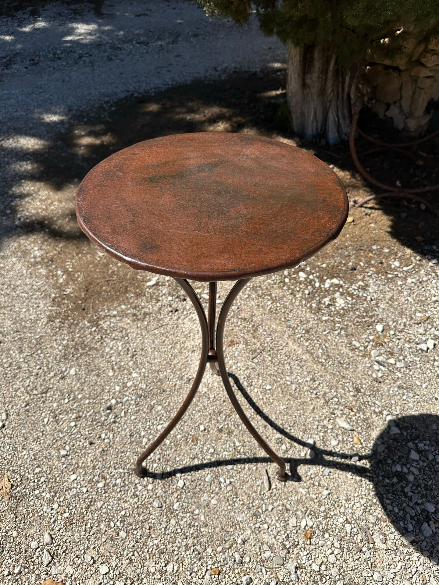 Artisanal wrought iron side table