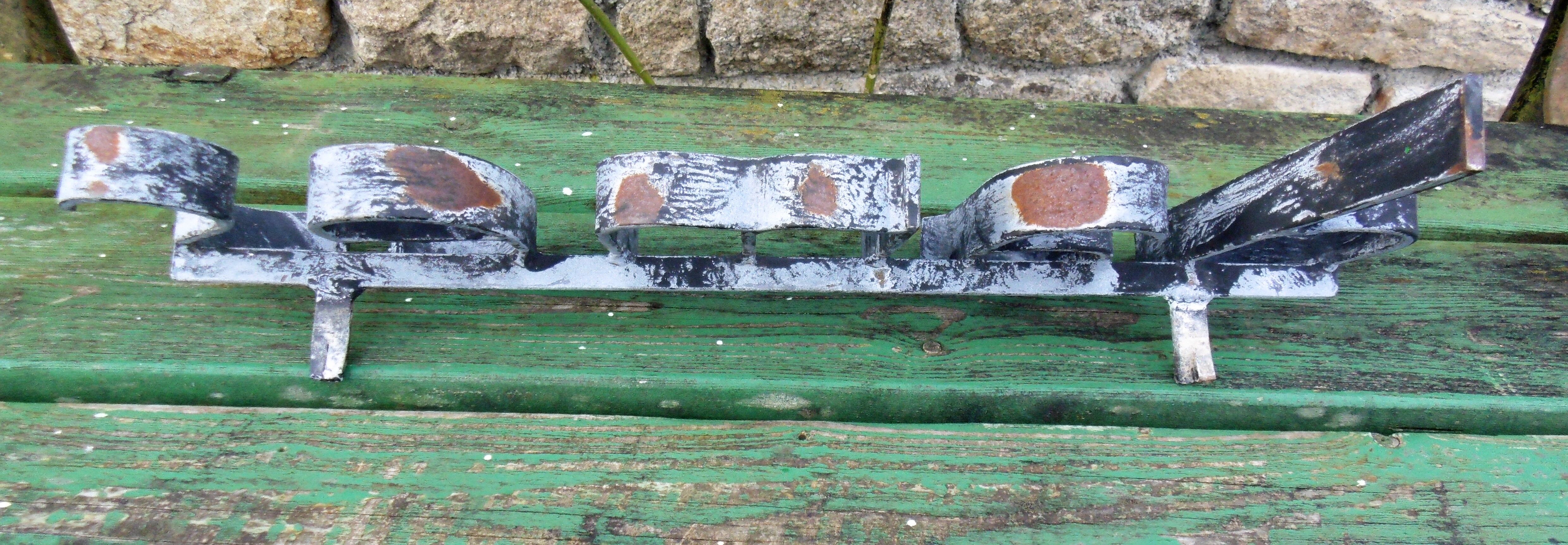 Former hairdresser sign "dames" in metal