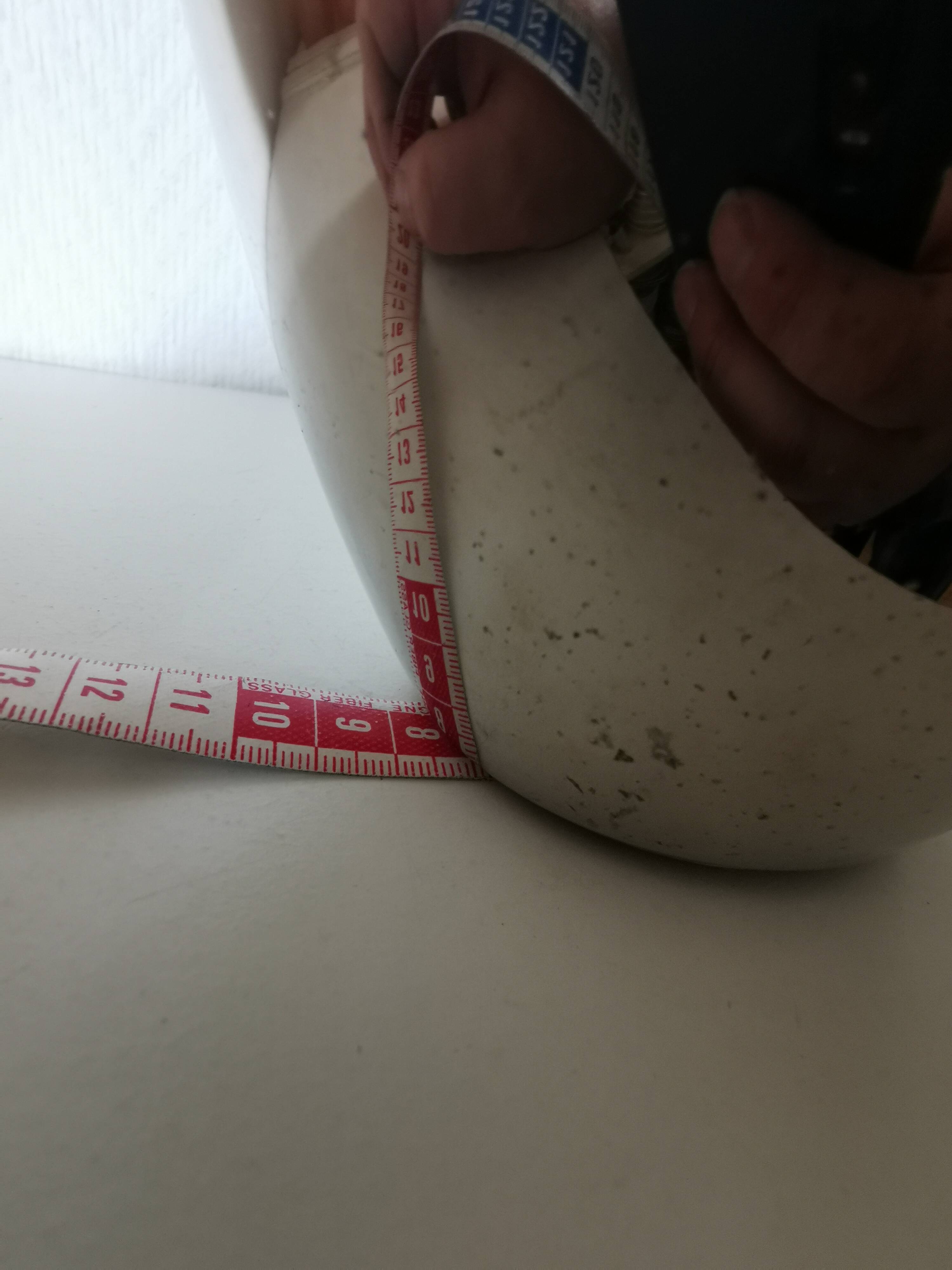 metal vase, flowers in relief