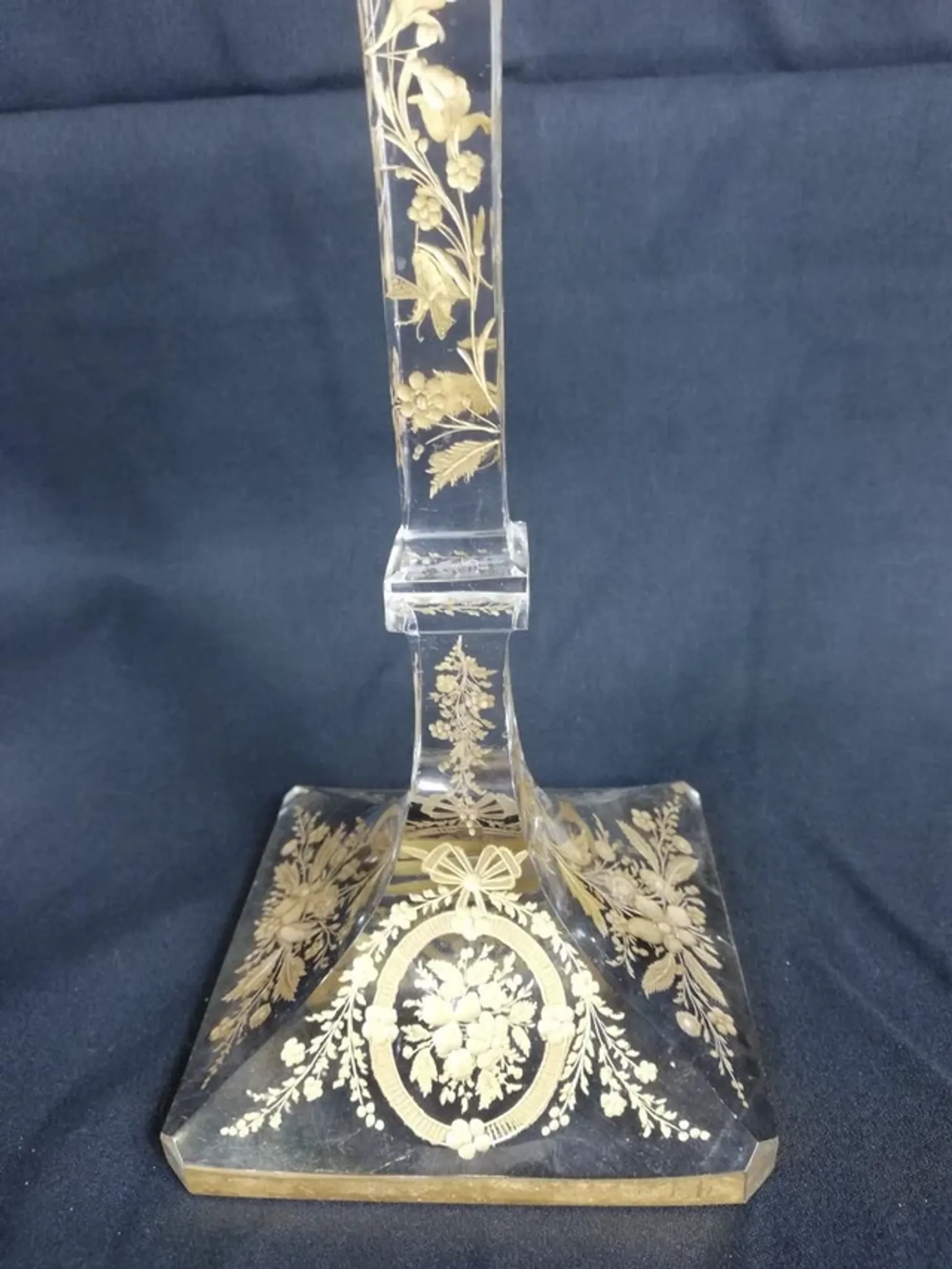 Antique glass candle holder, engraved and gilded.