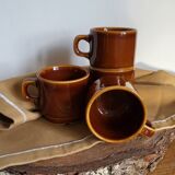 Set of 4 brown ceramic mugs