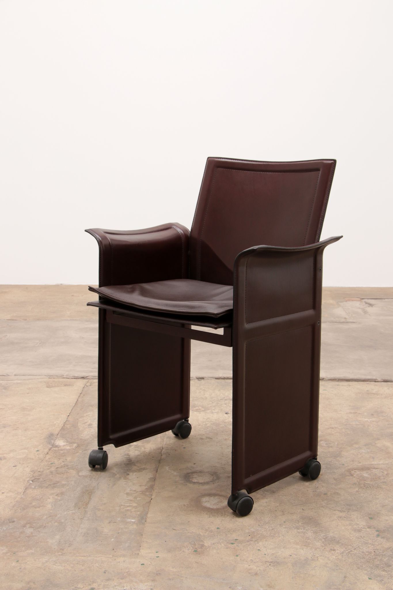 Tito Agnoli for Matteo Grassi leather dining table and six chairs