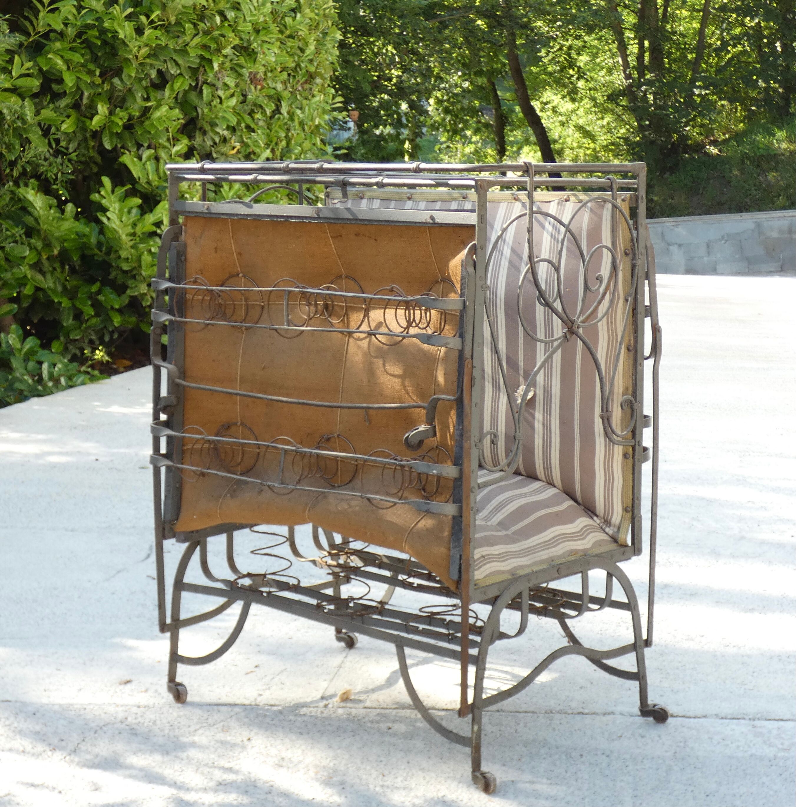 Folding wrought iron bed