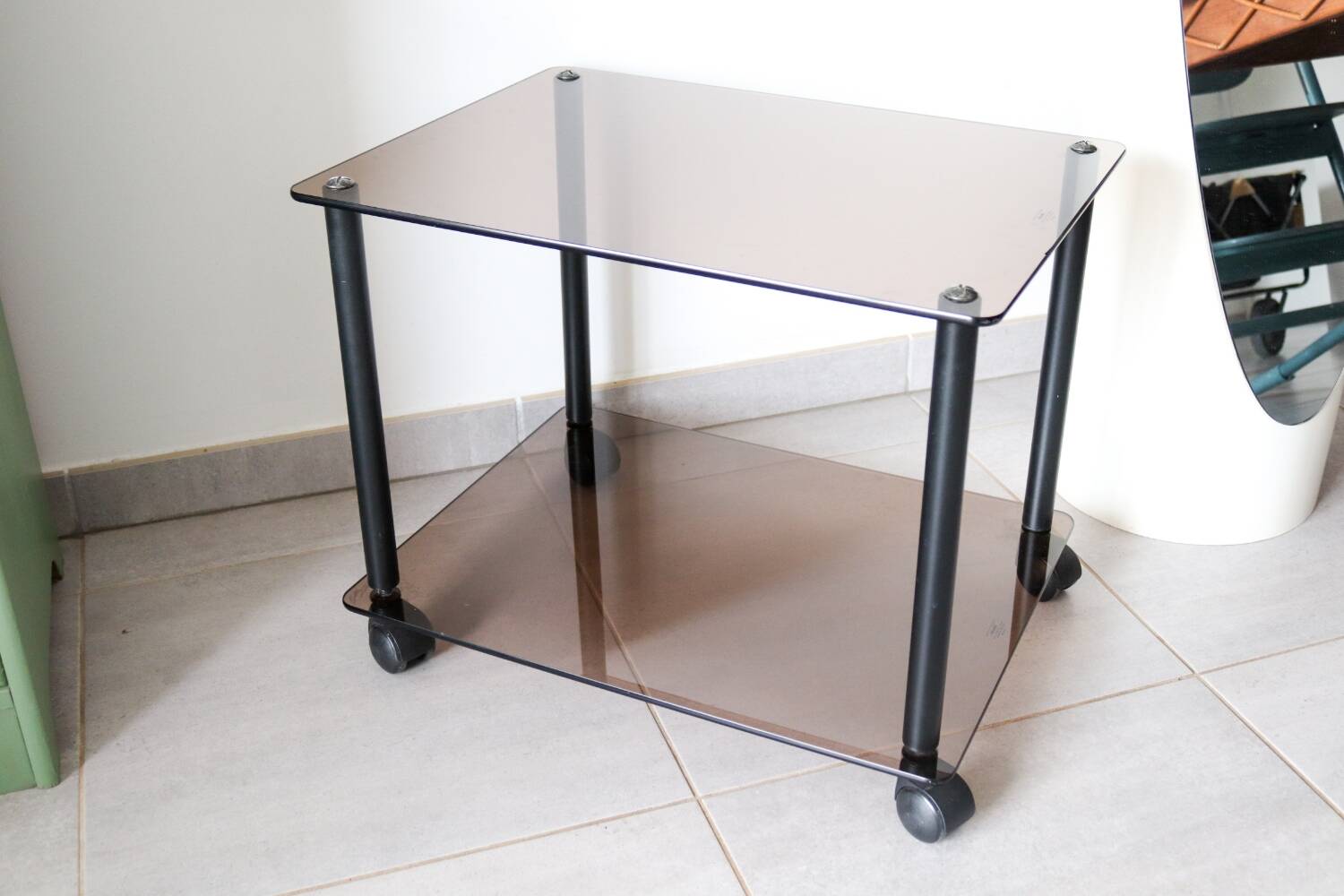 Erard tempered glass coffee table on wheels