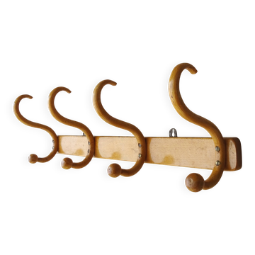 Wall coat rack with 4 hooks, around 1925, bent wood.
