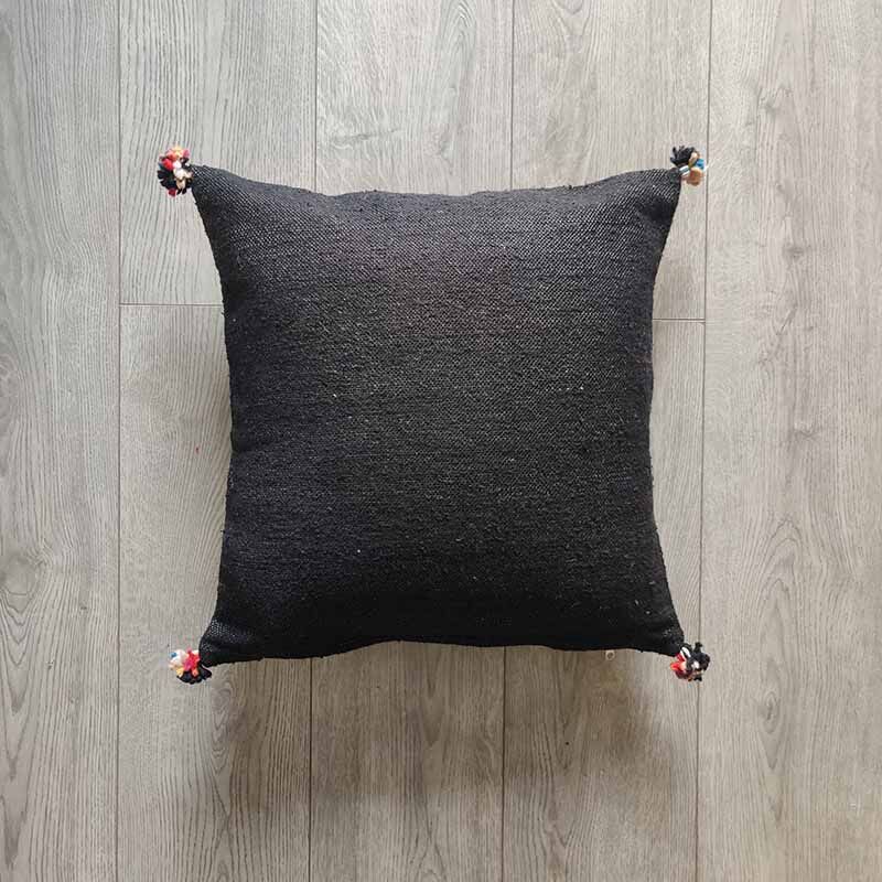 Black Moroccan cushion with cotton pompom