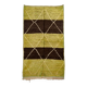 Hand-knotted low pile rug in vibrant earth tones by Anzal | 152 x 264 cm