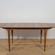 Mid-century teak extending dining table from McIntosh, UK.