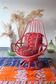 Restored vintage 70s armchair with custom-made Moroccan cushions, pink and red armchair