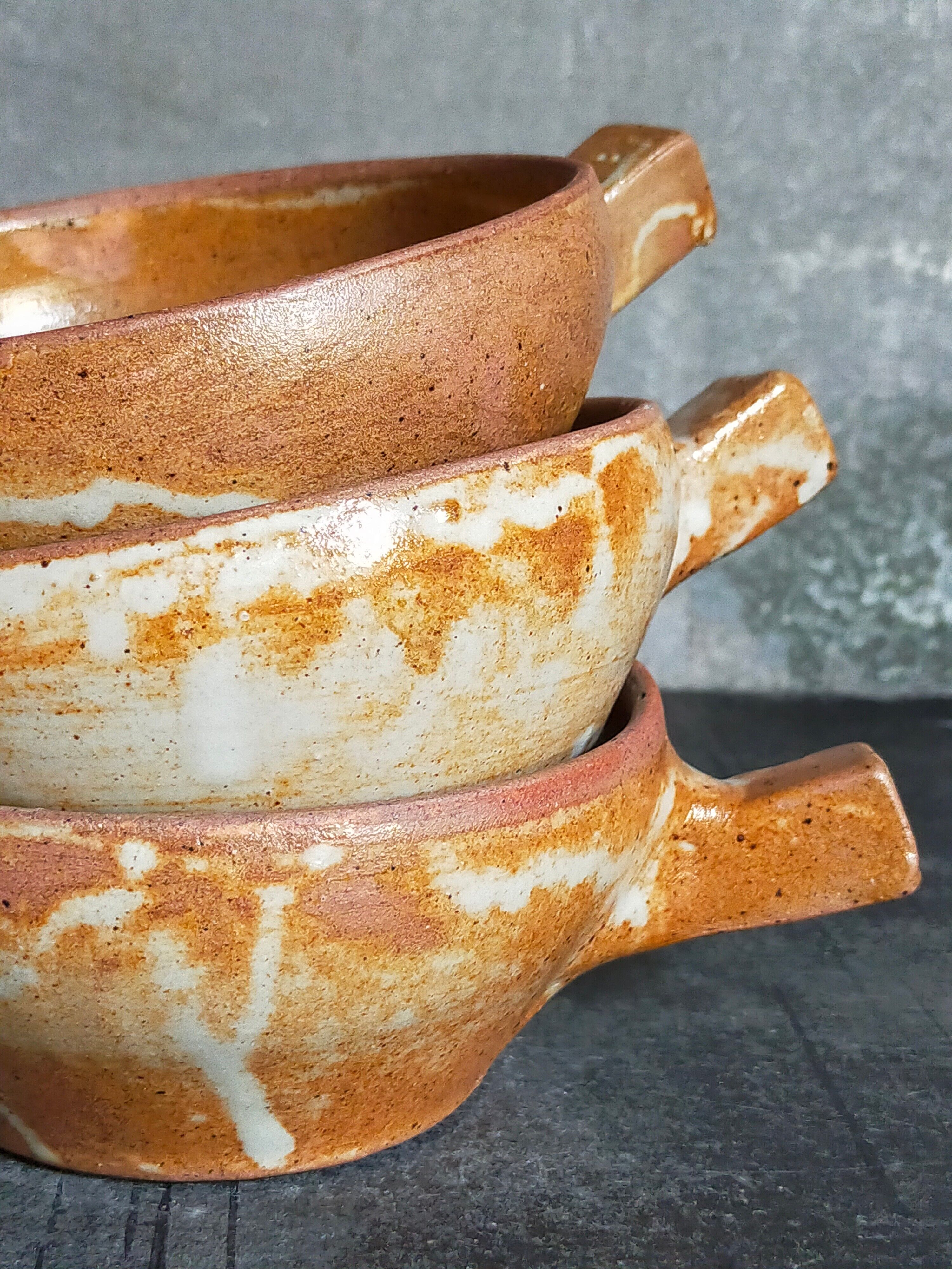 Three vintage marais sandstone bowls