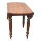 Table ronde aux côtés rabattables