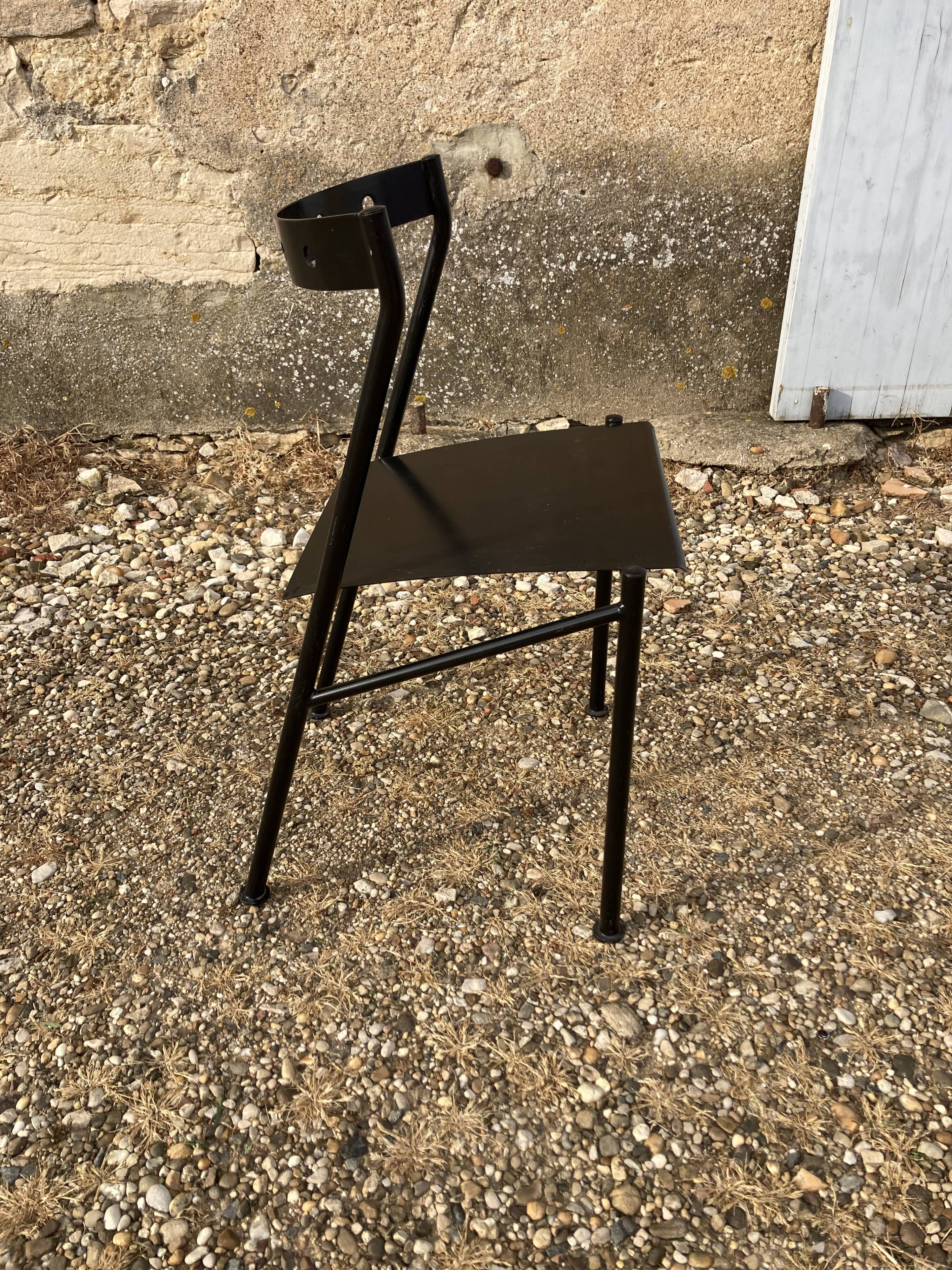 Series of 4 black iron chairs