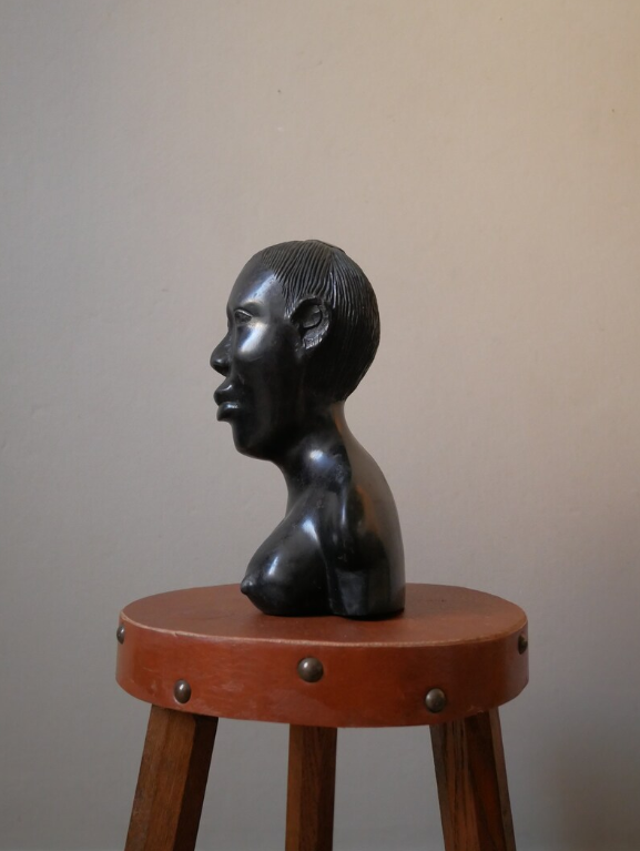 Bust of a woman in ebony African Art
