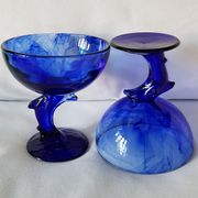 Set of 2 dolphin dessert cups in blue glass.