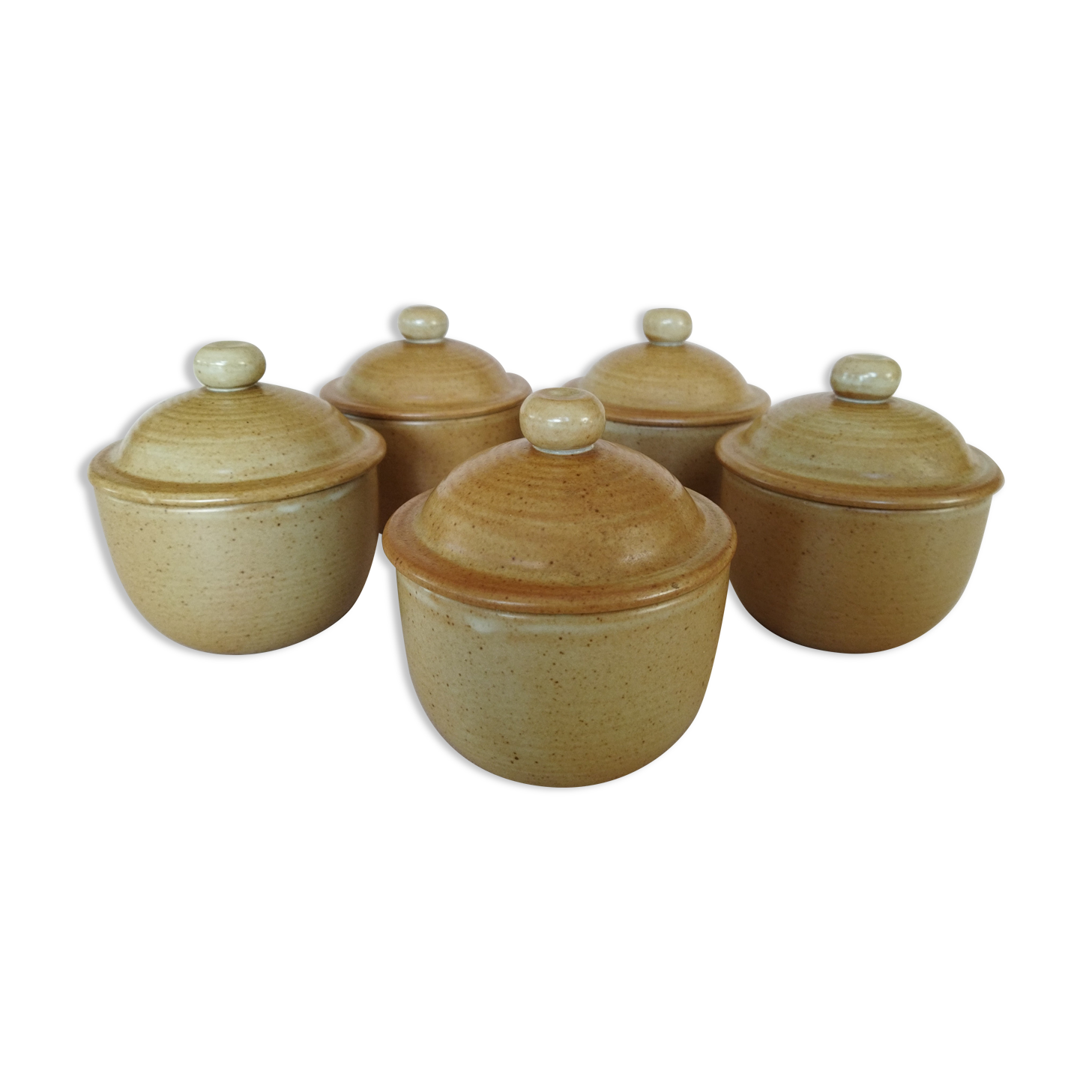 Covered tea bowls in CNP Village sandstone