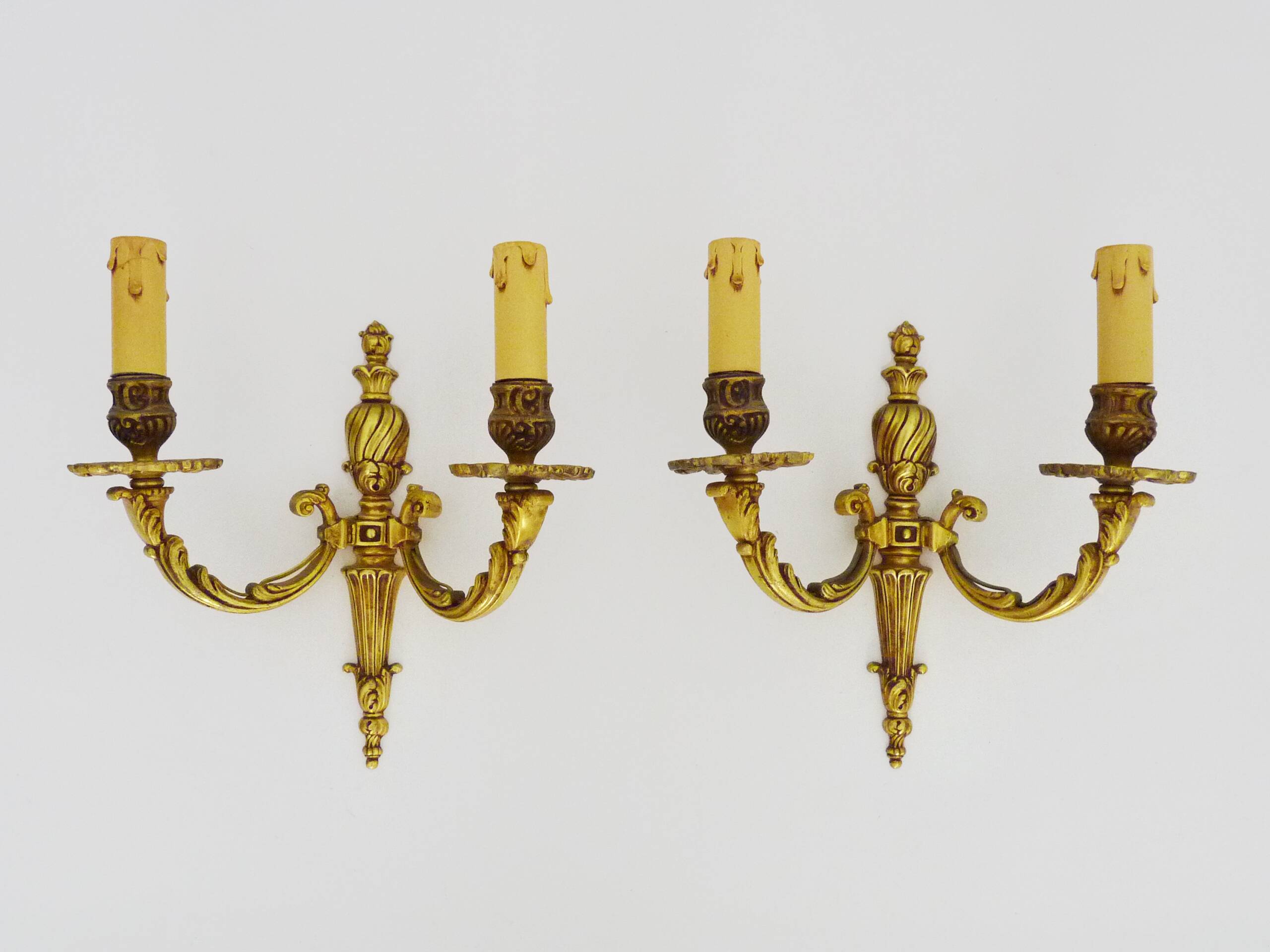 Old pair of bronze double-light wall sconces. 60s