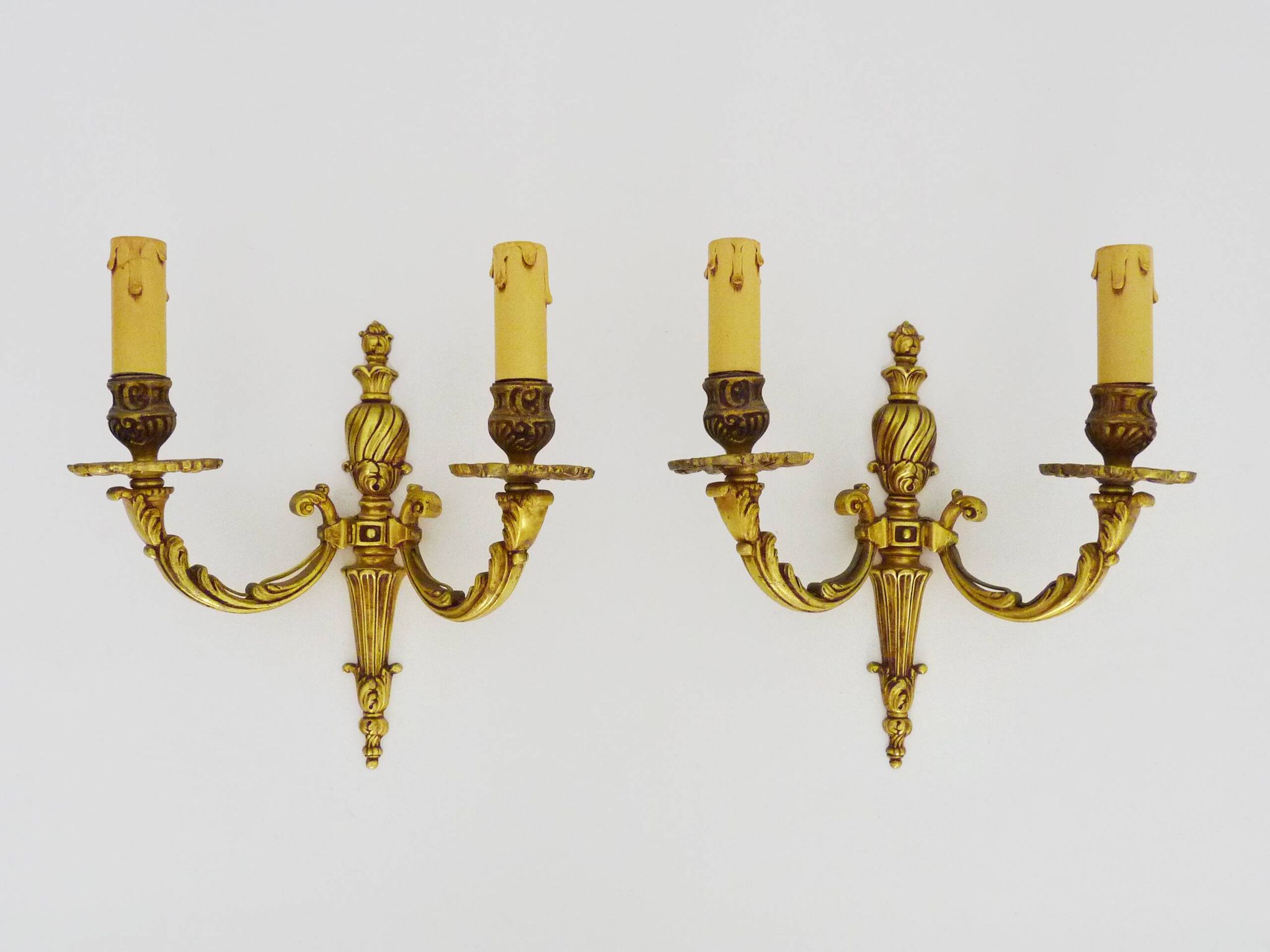 Old pair of bronze double-light wall sconces. 60s
