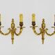 Old pair of bronze double-light wall sconces. 60s