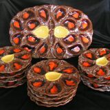 Service of 12 plates in oyster slip and its serving dish