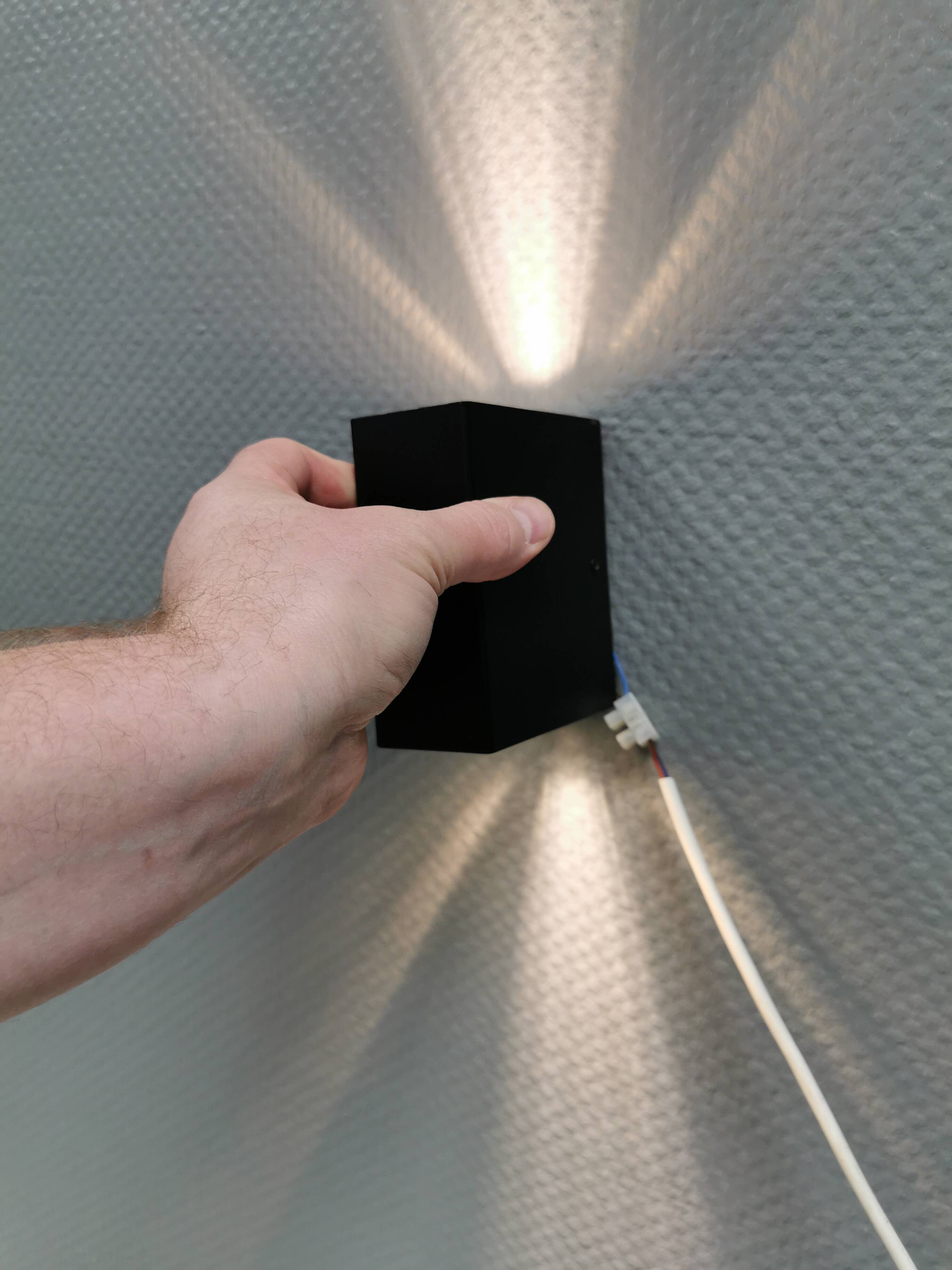 A beautiful up/down wall lamp, designed in Italy in the 1990s.