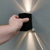 A beautiful up/down wall lamp, designed in Italy in the 1990s.