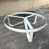 Round coffee table with a metal/leather frame and glass top by Roche Bobois.