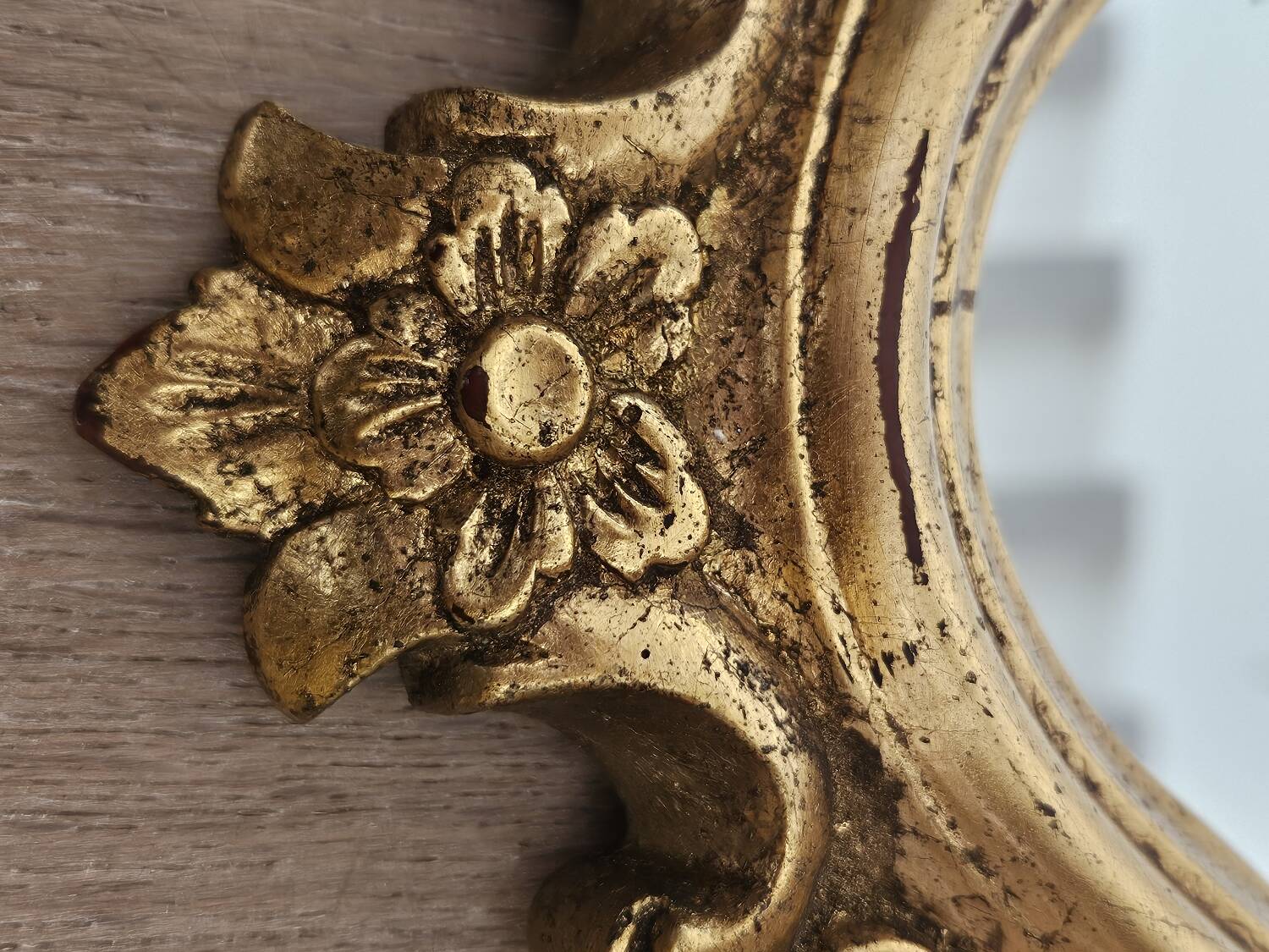 Rockery mirror under gilded frame