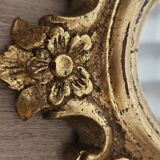Rockery mirror under gilded frame