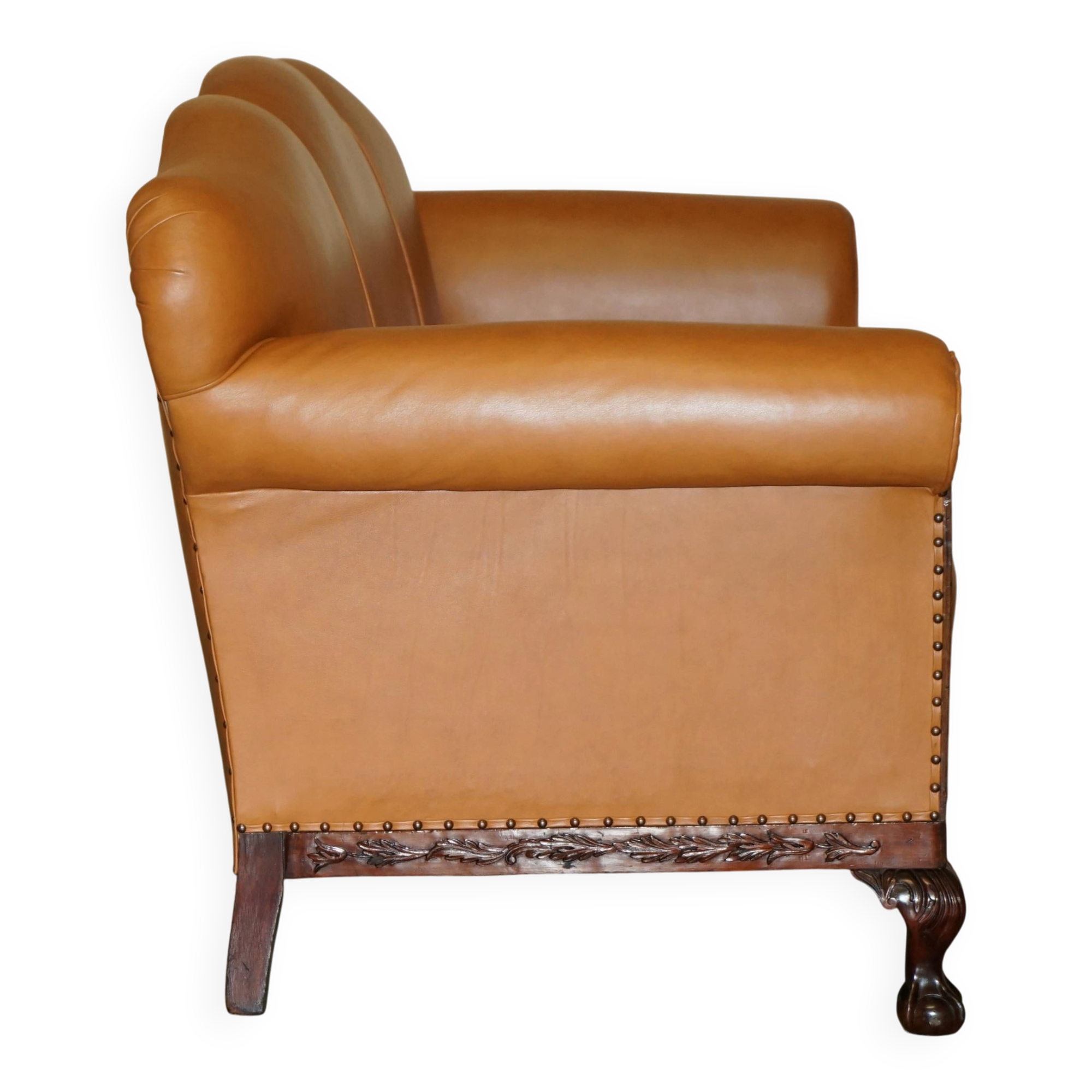Restored three-seater leather canapé in late Victorian style.