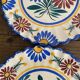 Henriot Quimper dessert plates, hand-painted earthenware.