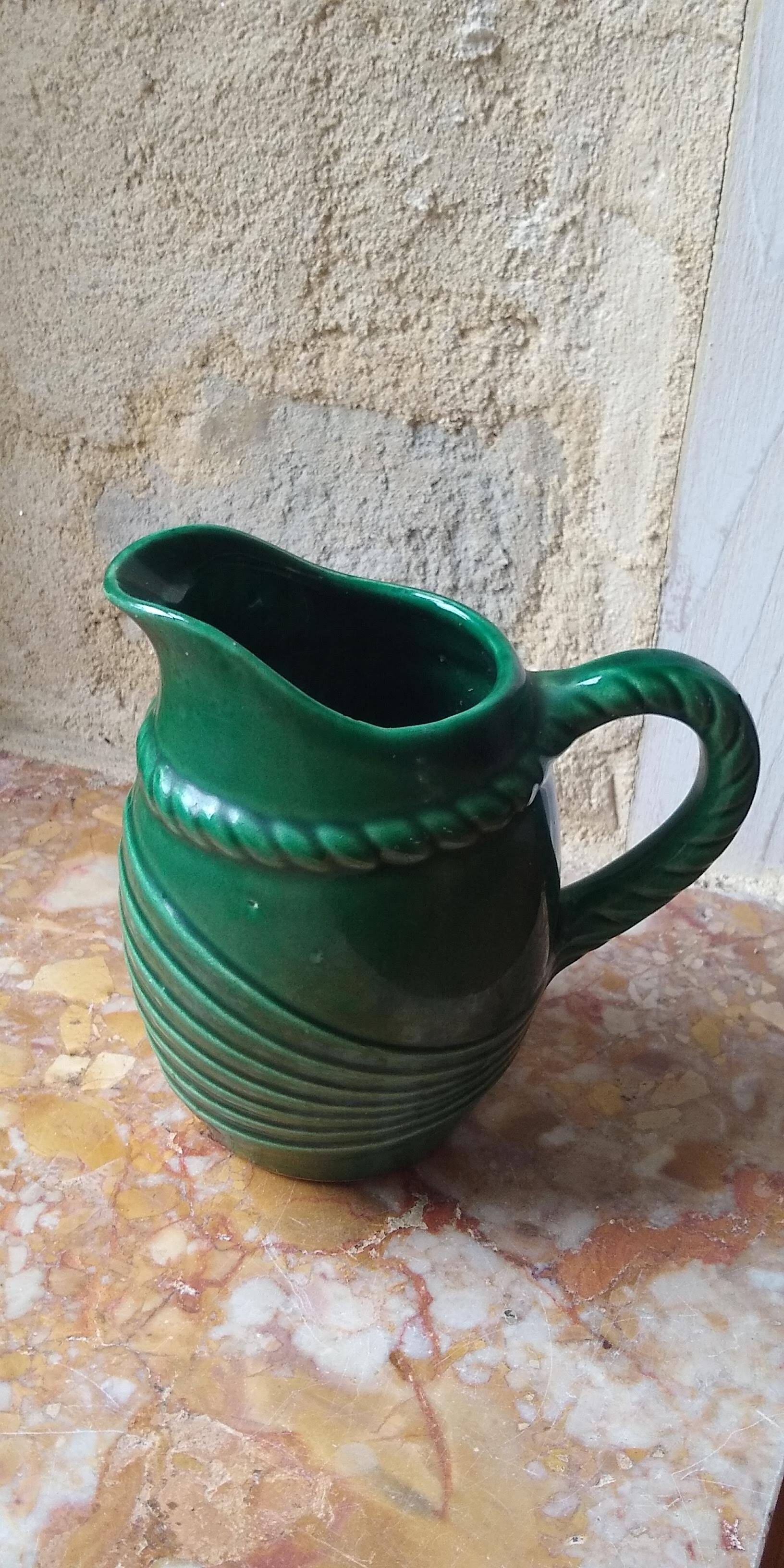 Green water pitcher by Poët Laval, Art Deco headband model
