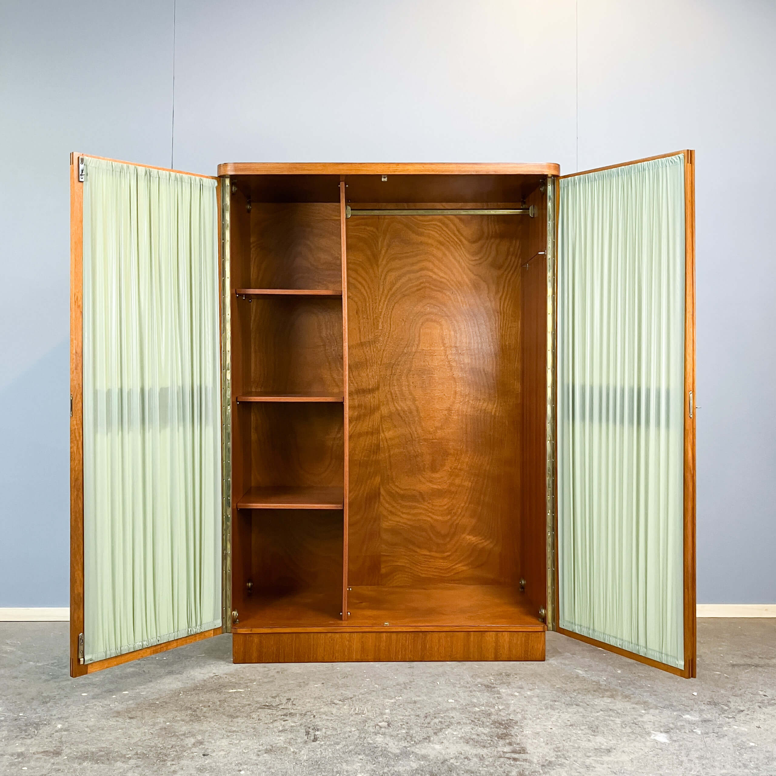 Art Deco cabinet with glass doors, various woods, 1930s
