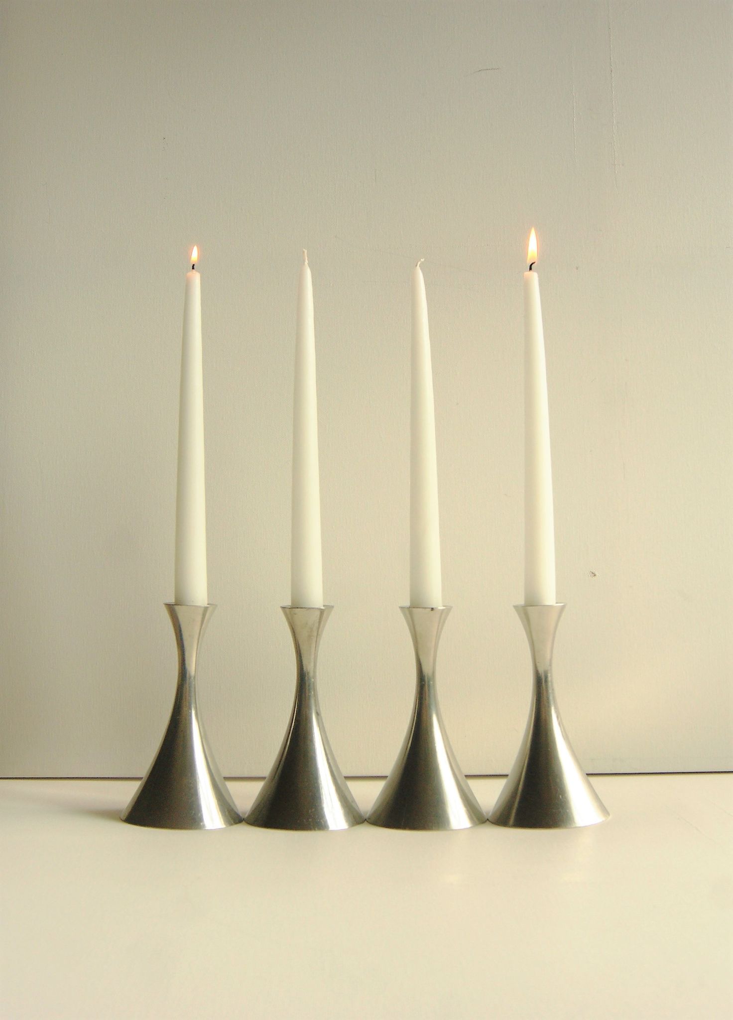 Set of 4 Art Deco candle holders by Just Andersen from the 1940s - fine elegant minimalist design.