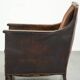 Art Deco design armchair finished in velvet and fitted with decorative nails