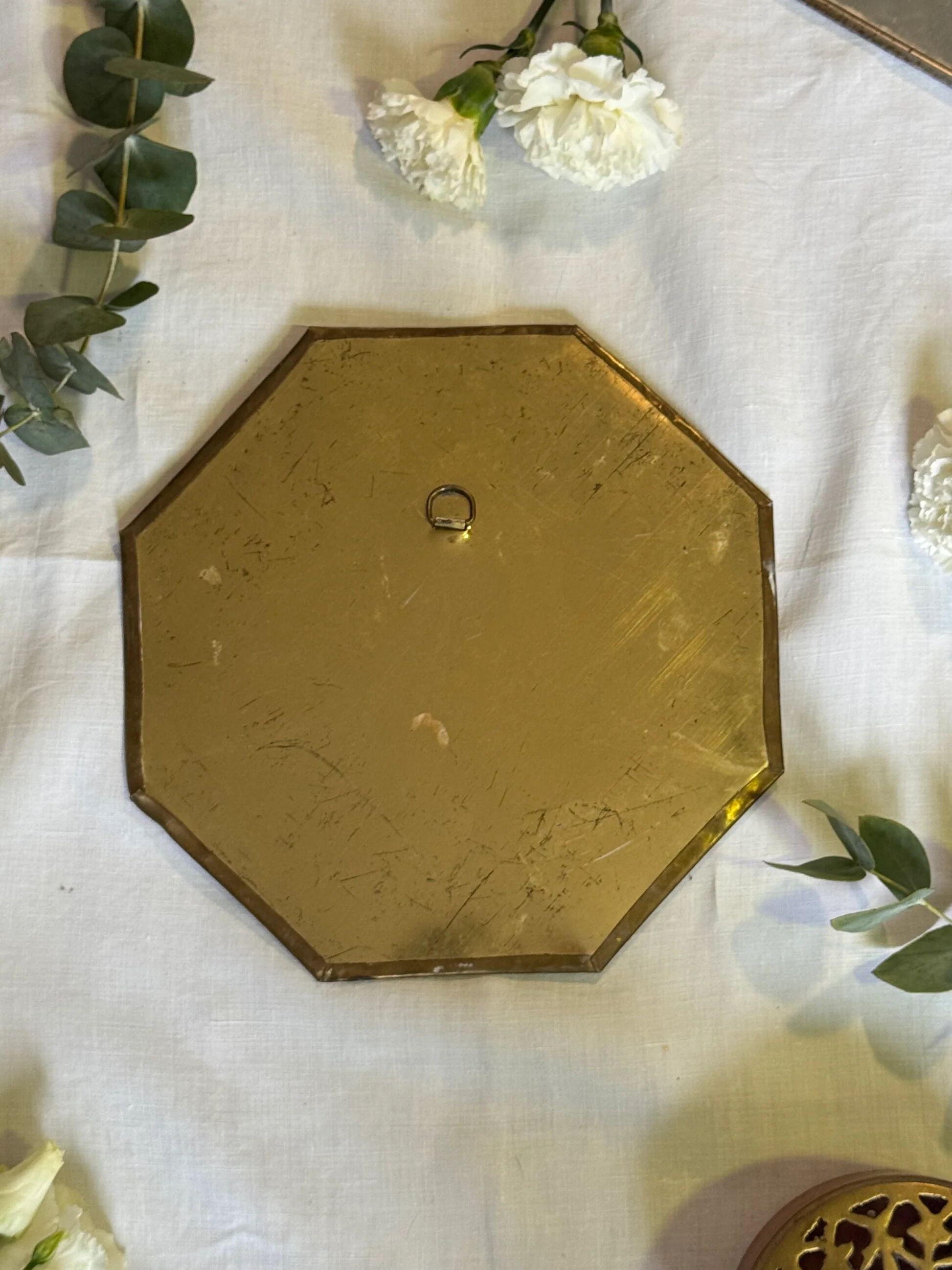 Oriental brass mirror