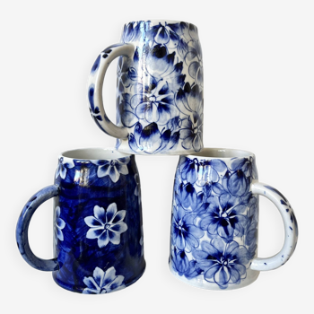 Tankards or large mugs with blue flowers