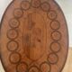 Oval bedside table from the Transition period in marquetry and bronze.