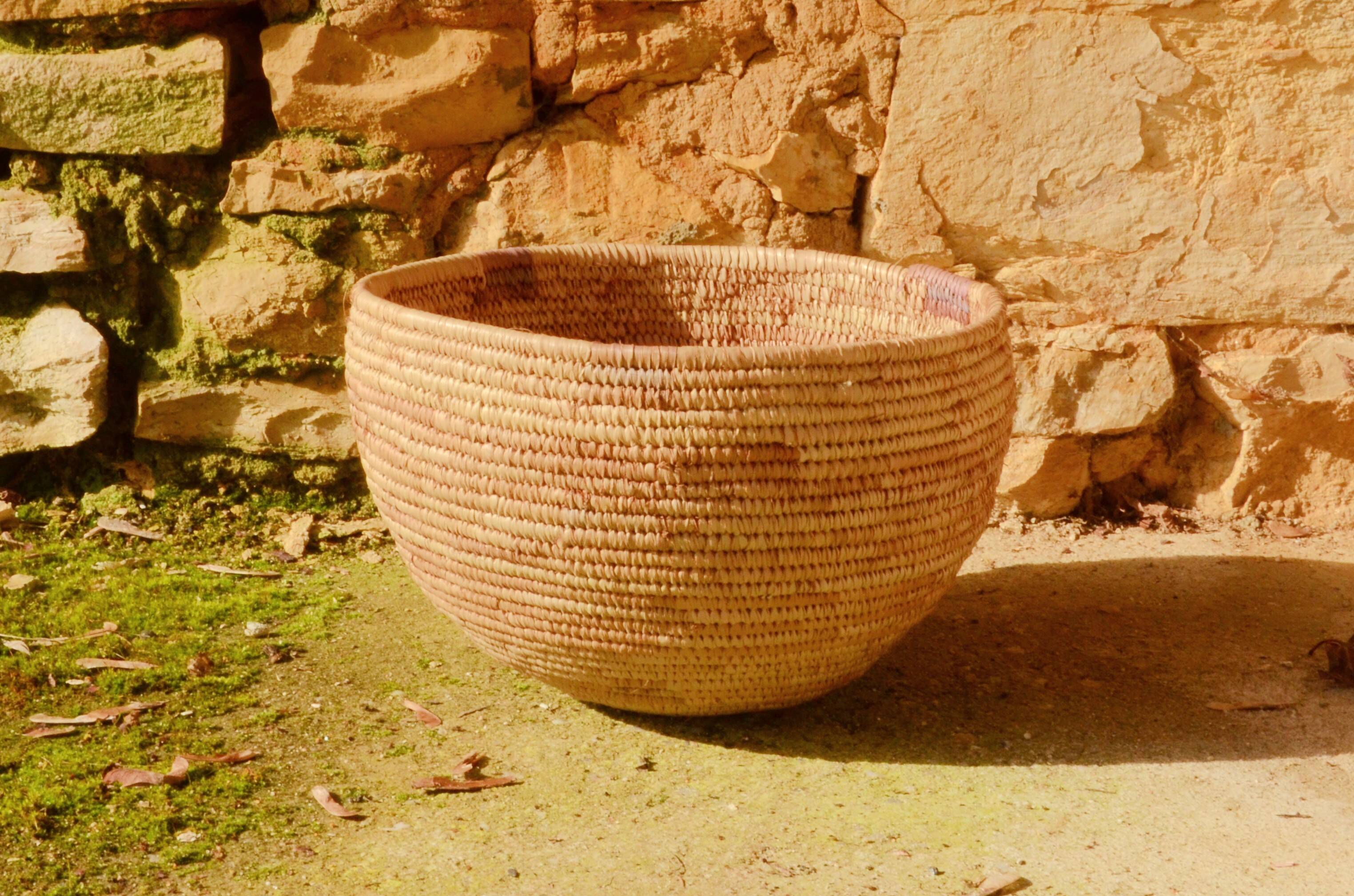 Handwoven basket made from rattan leaves, West Africa, 25x16cm