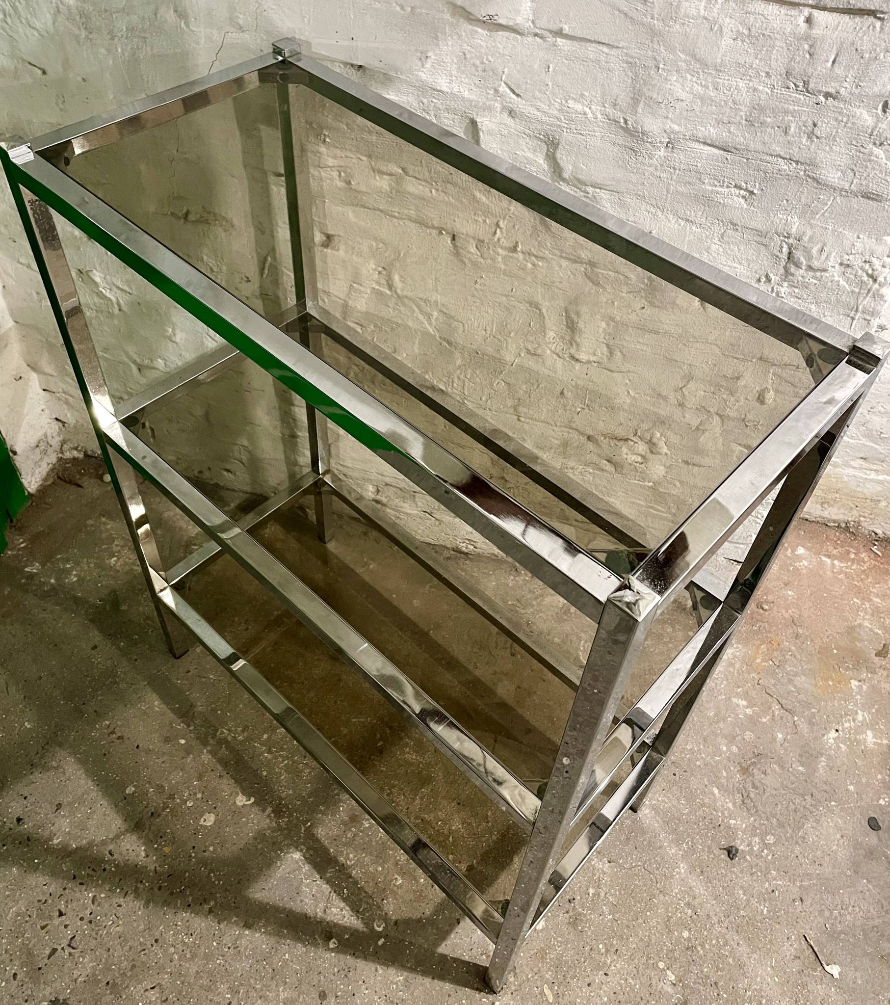 High chrome shelf with 3 smoked glass shelves Roche Bobois